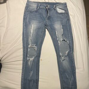 Distressed Blue Jeans